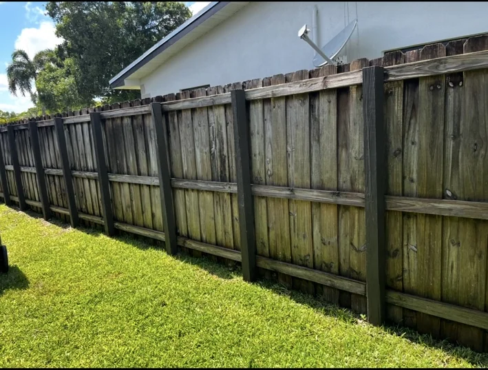Wood fence before refinishing